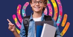 School boy hold books